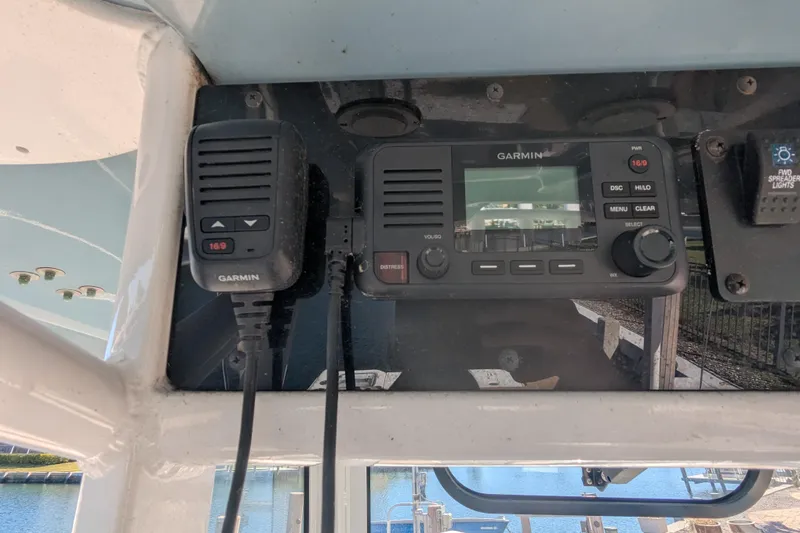 Slide: The Image of Garmin marine radio on 2021 Sea Hunt Gamefish 30 Forward Seating boat dashboard. - 15
