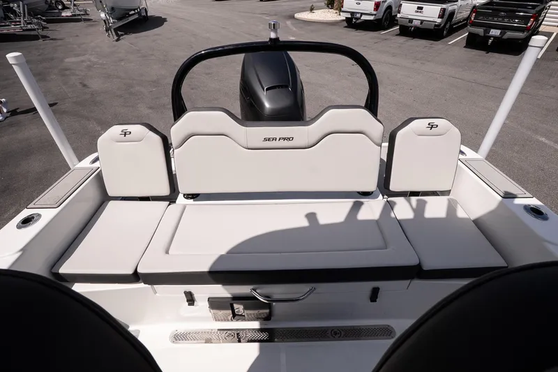 Slide: The Image of 2026 Sea Pro 245FLXR Sandbar boat interior with cushioned seating and sleek design. - 10