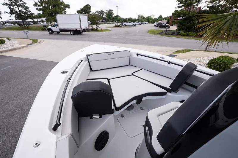 Slide: The Image of 2026 Sea Pro 245FLXR Sandbar boat interior with sleek seating and modern design. - 16