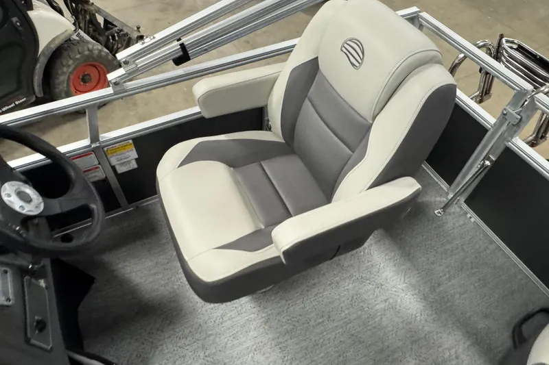 Slide: The Image of 2026 Sun Tracker Bass Buggy 16 XL Select boat seat, featuring gray and white upholstery. - 9
