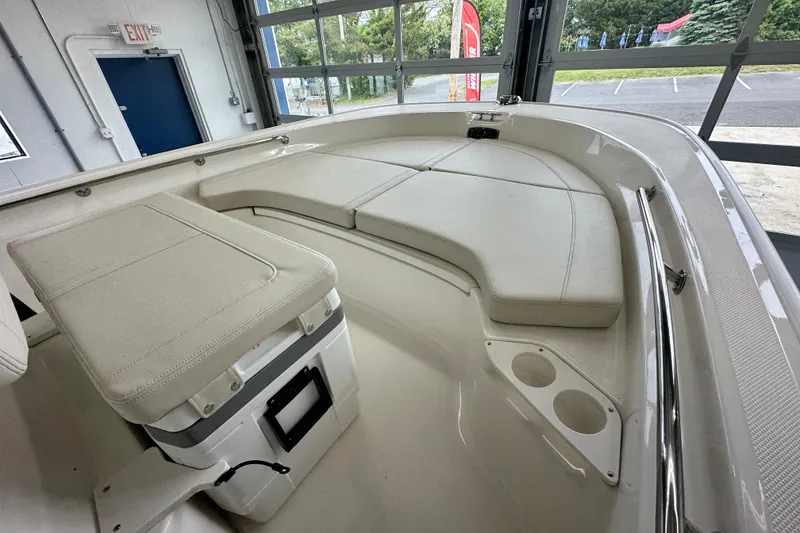 Slide: The Image of 2026 Boston Whaler 190 Montauk interior with cushioned seating and storage. - 24