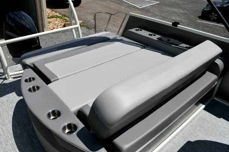Slide: The Image of 2024 Premier 250 RL PTX boat with luxurious seating and cup holders. - 6