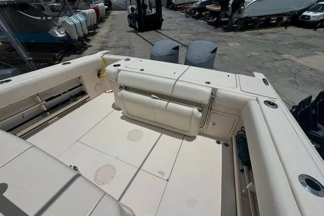 Slide: The Image of 2017 Grady-White Canyon 306 boat interior, featuring spacious seating and storage areas. - 6