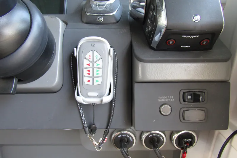 Slide: The Image of Control panel of 2024 Nimbus Commuter 11 with remote and engine controls. - 33