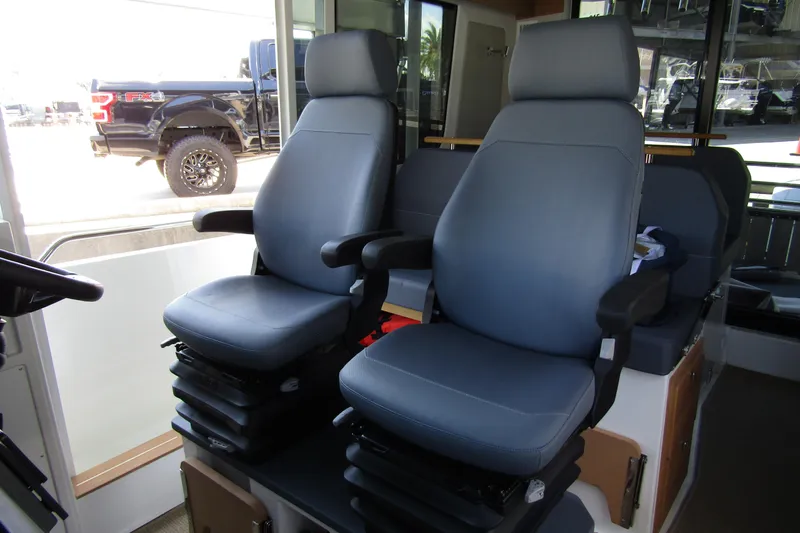 Slide: The Image of Interior of 2024 Nimbus Commuter 11 with two ergonomic seats. - 36