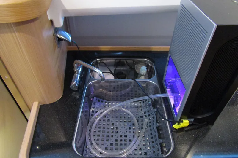 Slide: The Image of Modern kitchen sink setup in 2024 Nimbus Commuter 11 boat. - 53