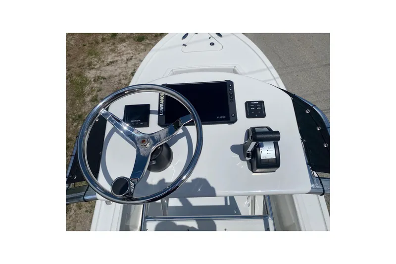 Slide: The Image of 2026 Pair Customs 21 Center Console MV dashboard with steering wheel and controls. - 3