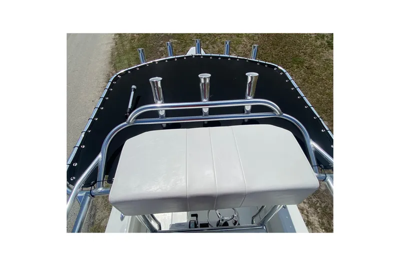 Slide: The Image of 2026 Pair Customs 21 Center Console MV boat with rod holders and cushioned seat. - 4