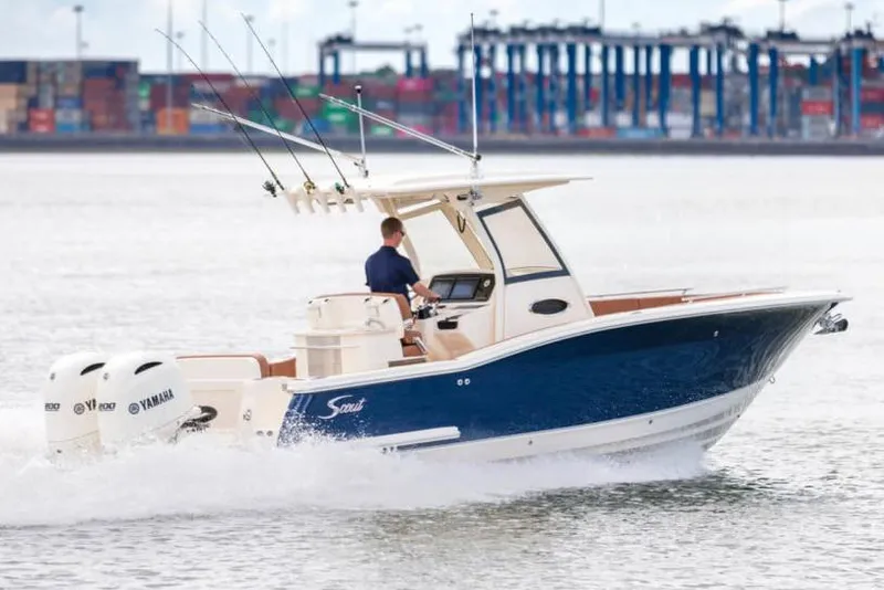 Slide: The Image of Manufacturer Provided Image: 2021 Scout 277 LXF boat cruising with dual Yamaha engines. - 5