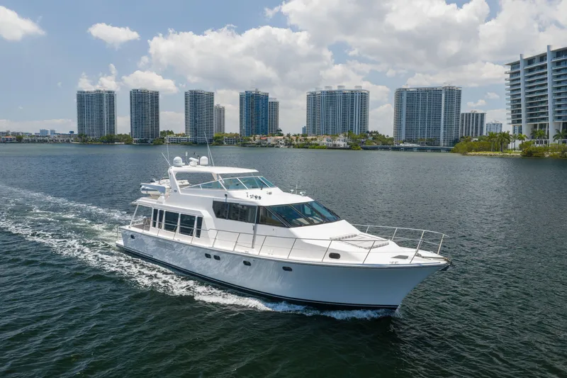 The Image of 2007 Pacific Mariner Pilothouse yacht cruising near modern city skyline. - 1