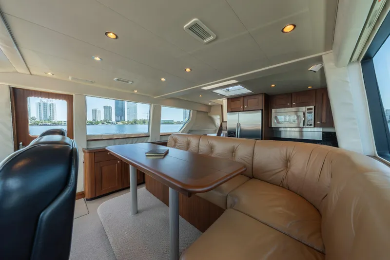 Slide: The Image of Luxurious 2007 Pacific Mariner Pilothouse yacht interior with leather seating and modern kitchen. - 14