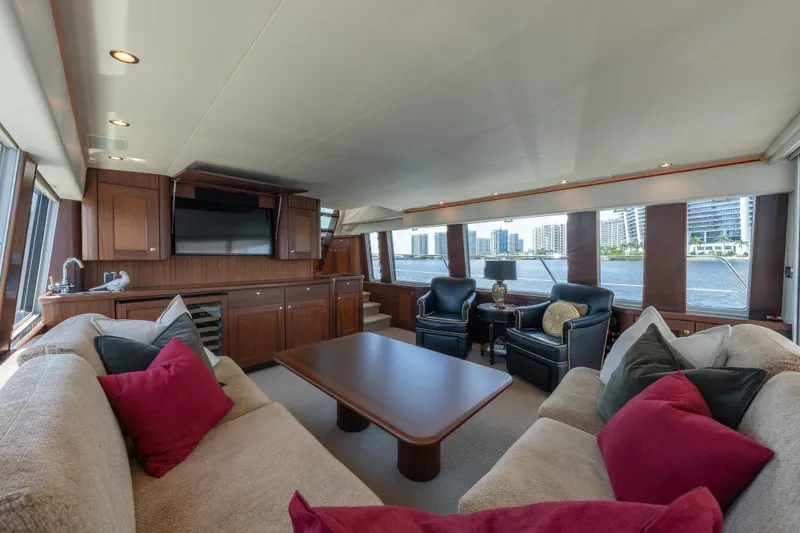 Slide: The Image of Luxurious 2007 Pacific Mariner Pilothouse yacht interior with plush seating and waterfront views. - 2