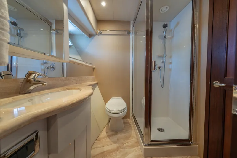 Slide: The Image of Luxurious bathroom in a 2007 Pacific Mariner Pilothouse yacht with shower and vanity. - 26