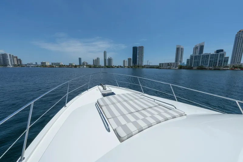 Slide: The Image of 2007 Pacific Mariner Pilothouse yacht cruising near city skyline on a sunny day. - 35