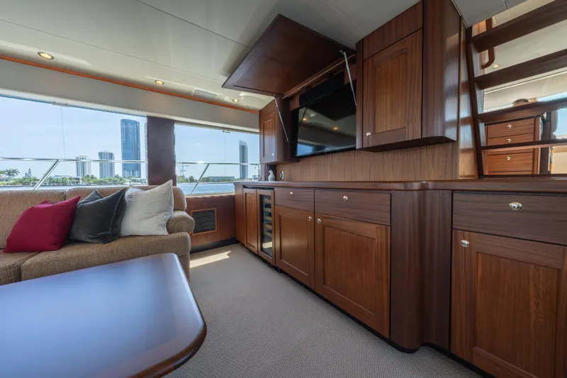 Slide: The Image of Luxurious interior of a 2007 Pacific Mariner Pilothouse yacht with elegant wood cabinetry. - 4