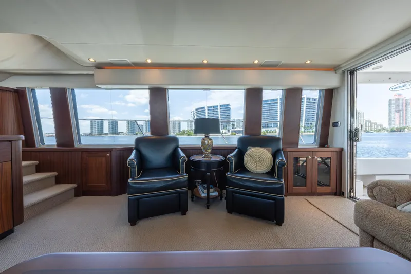 Slide: The Image of Luxurious 2007 Pacific Mariner Pilothouse yacht interior with elegant seating and waterfront view. - 5