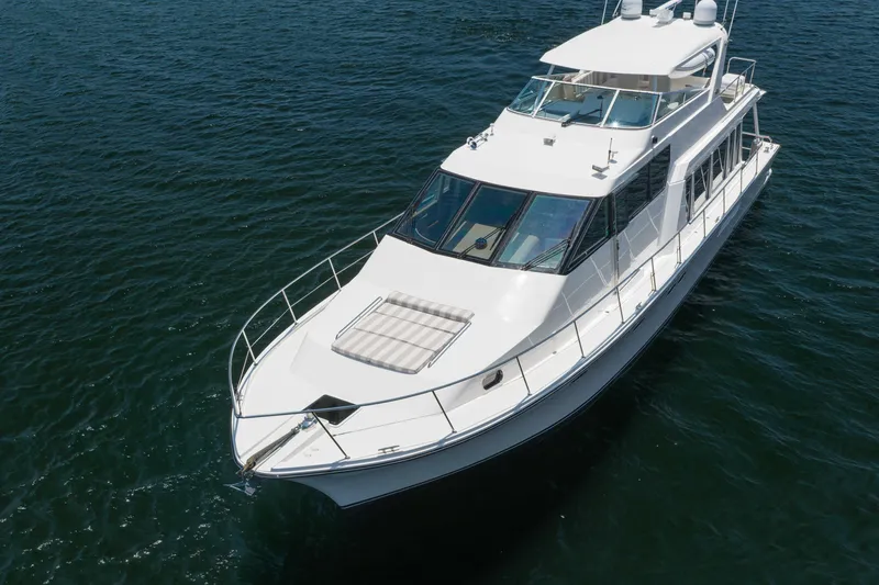 Slide: The Image of 2007 Pacific Mariner Pilothouse yacht cruising on open water. - 52