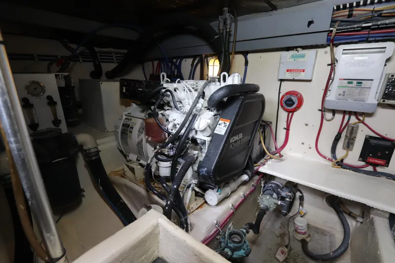 Slide: The Image of Engine room of 2004 Luhrs 38 Convertible with Kohler power systems. - 9