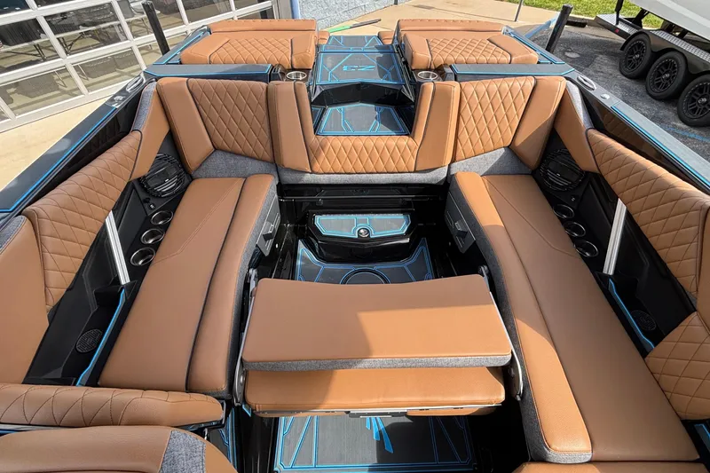 Slide: The Image of Luxurious interior of 2026 Tigé Z3 boat with tan leather seating and modern design. - 23