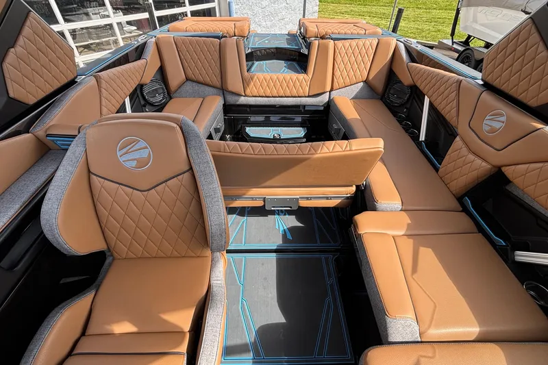 Slide: The Image of Luxurious interior of 2026 Tigé Z3 boat with tan leather seating and modern design. - 24