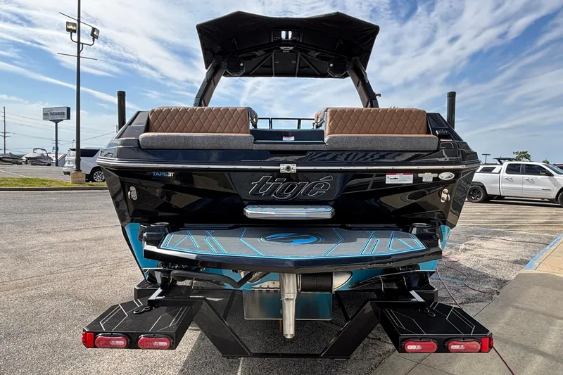 Slide: The Image of 2026 Tigé Z3 boat rear view with sleek design and modern features. - 3