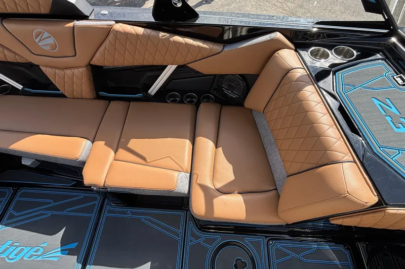 Slide: The Image of Luxurious interior of 2026 Tigé Z3 boat with tan leather seating and modern design. - 40