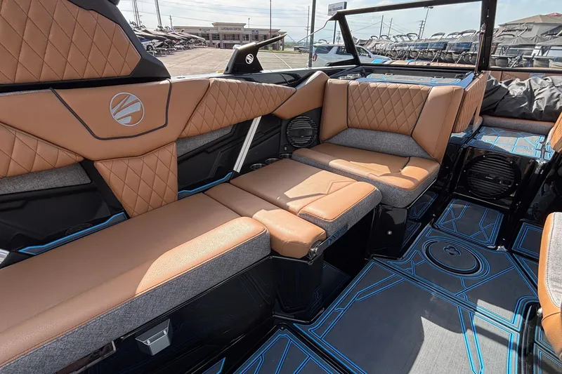 Slide: The Image of Luxurious interior of 2026 Tigé Z3 boat with tan leather seating and modern design. - 41