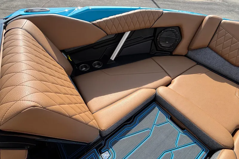 Slide: The Image of Luxurious interior of 2026 Tigé Z3 boat with tan leather seating and modern design. - 48
