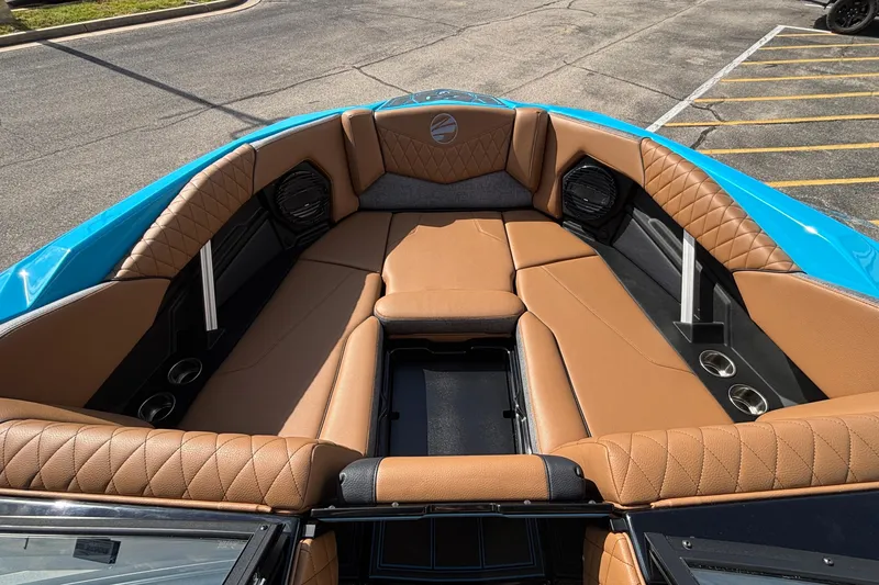 Slide: The Image of Luxurious interior of 2026 Tigé Z3 boat with tan seating and blue accents. - 50