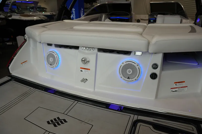 Slide: The Image of Rear view of 2019 Four Winns H230 boat with speakers. - 10