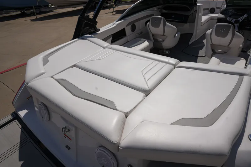 Slide: The Image of Interior of a 2019 Four Winns H230 boat with white seating. - 13