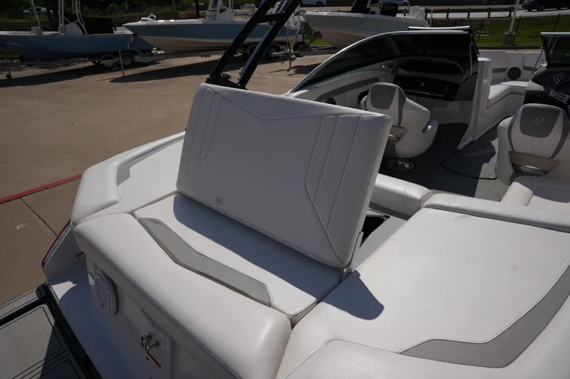 Slide: The Image of Interior of a 2019 Four Winns H230 boat with white seating. - 14