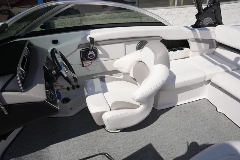 Slide: The Image of Interior of a 2019 Four Winns H230 boat with white seating. - 24