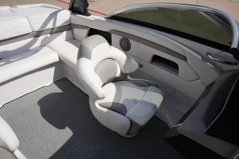 Slide: The Image of Interior of a 2019 Four Winns H230 boat with white seating. - 32