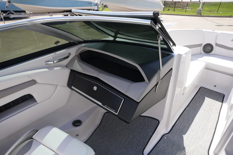 Slide: The Image of Interior of a 2019 Four Winns H230 boat with gray seating. - 33