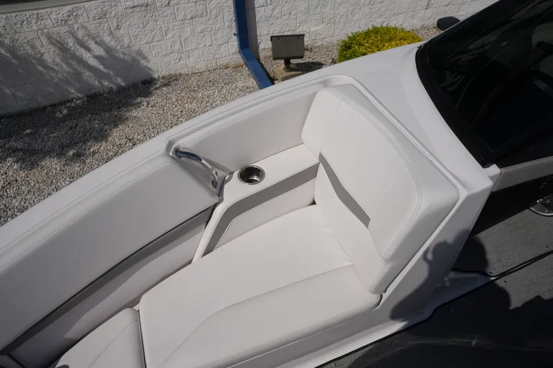 Slide: The Image of Interior of a 2019 Four Winns H230 boat with white seating. - 36