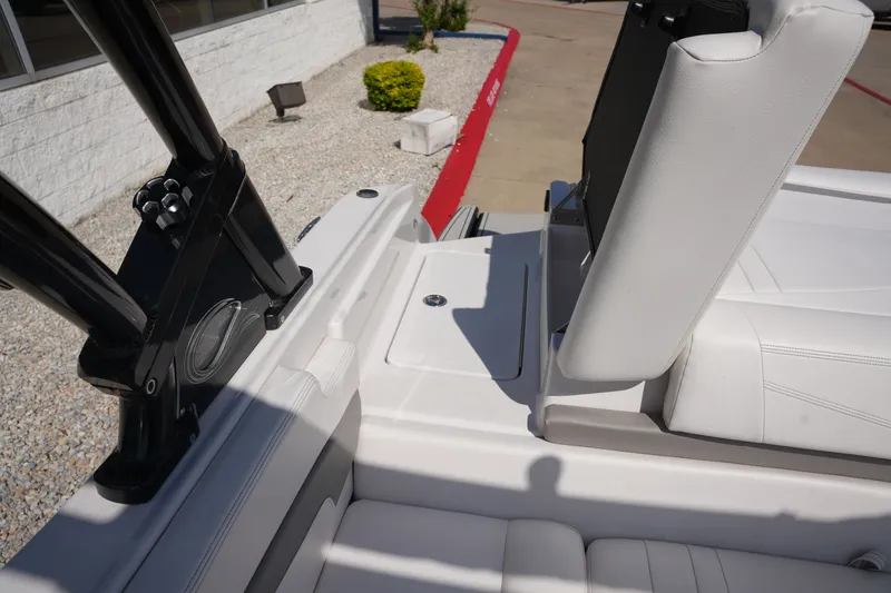 Slide: The Image of Interior of a 2019 Four Winns H230 boat, white upholstery. - 40