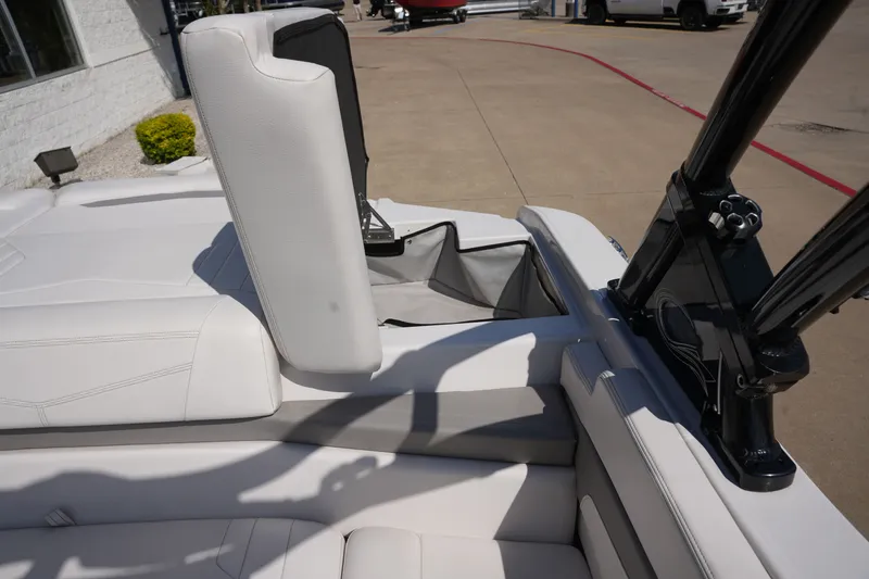 Slide: The Image of Interior of a 2019 Four Winns H230 boat with white seating. - 41