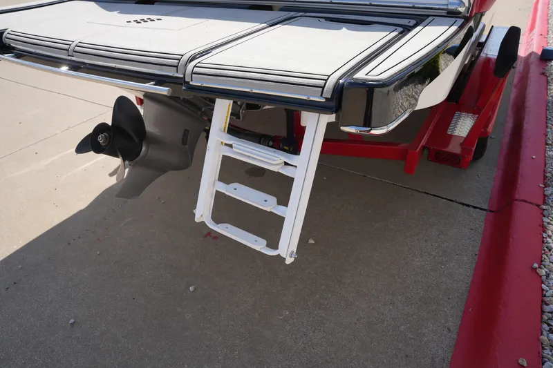 Slide: The Image of 2019 Four Winns H230 boat with ladder and propeller. - 9