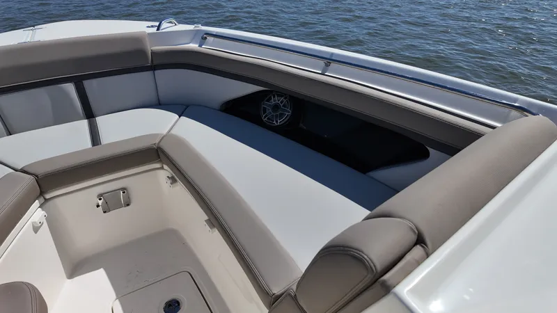 Slide: The Image of The 2027 Boston Whaler 330 Vantage features sleek seating with gray upholstery. - 29