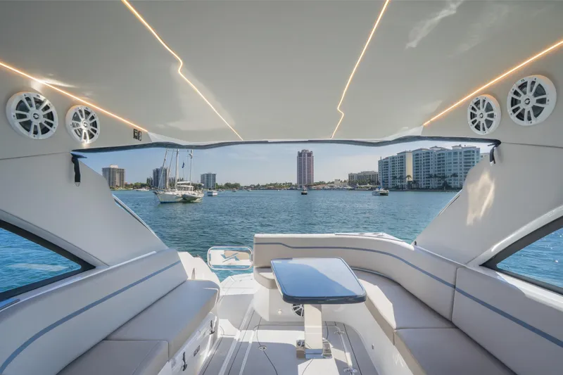 Slide: The Image of Luxurious interior of 2025 NX Boats NX41 HORIZON yacht with waterfront city view. - 33