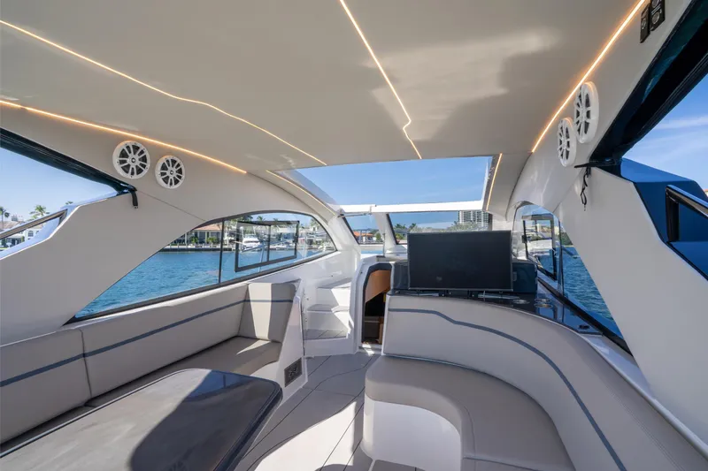 Slide: The Image of Luxurious interior of 2025 NX Boats NX41 HORIZON yacht with modern seating and entertainment system. - 35