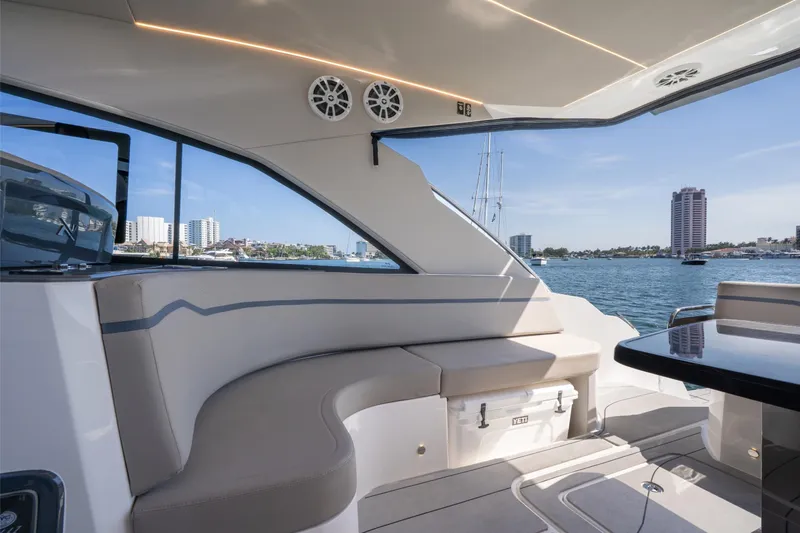 Slide: The Image of Luxurious interior of 2025 NX Boats NX41 HORIZON yacht with waterfront view. - 36