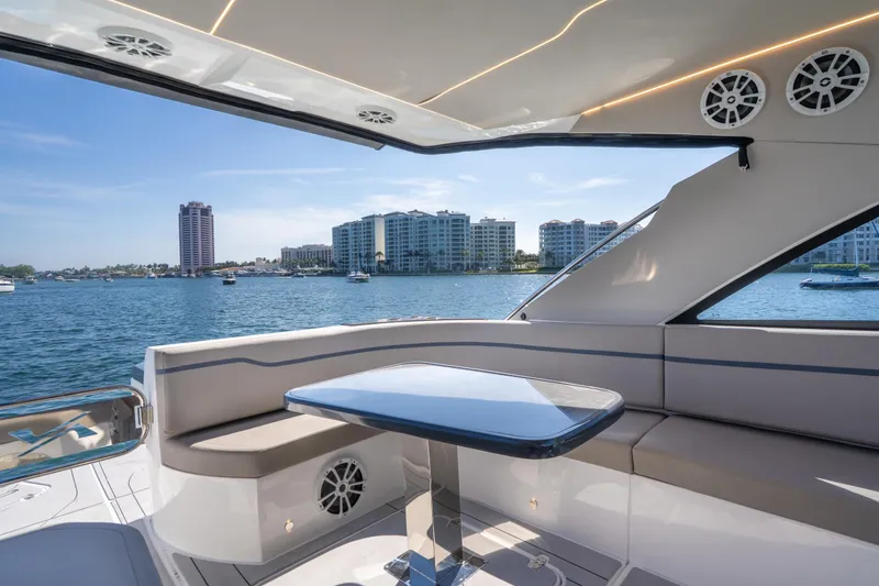Slide: The Image of Luxurious 2025 NX Boats NX41 HORIZON yacht interior with waterfront cityscape view. - 38