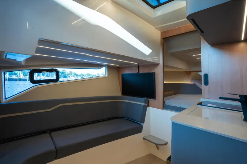 Slide: The Image of Interior of 2025 NX Boats NX41 HORIZON, featuring modern seating and sleek design elements. - 43