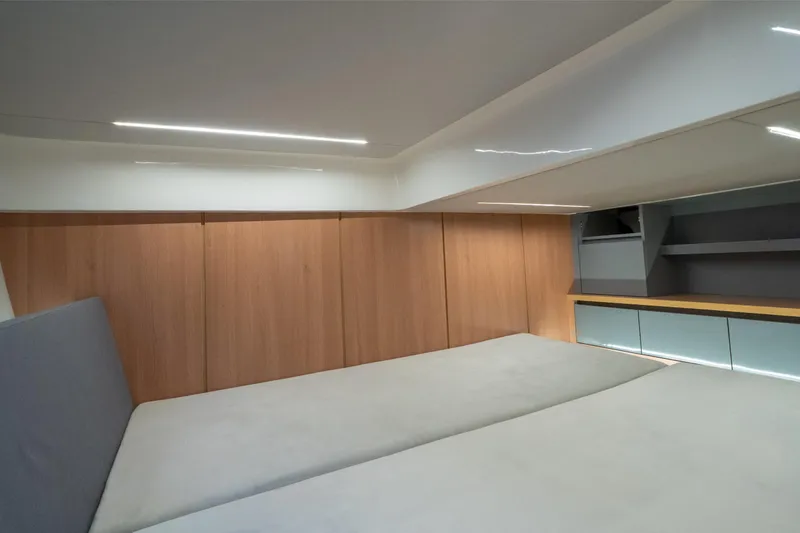 Slide: The Image of Interior cabin of 2025 NX Boats NX41 HORIZON, featuring modern wood paneling and sleek design. - 48
