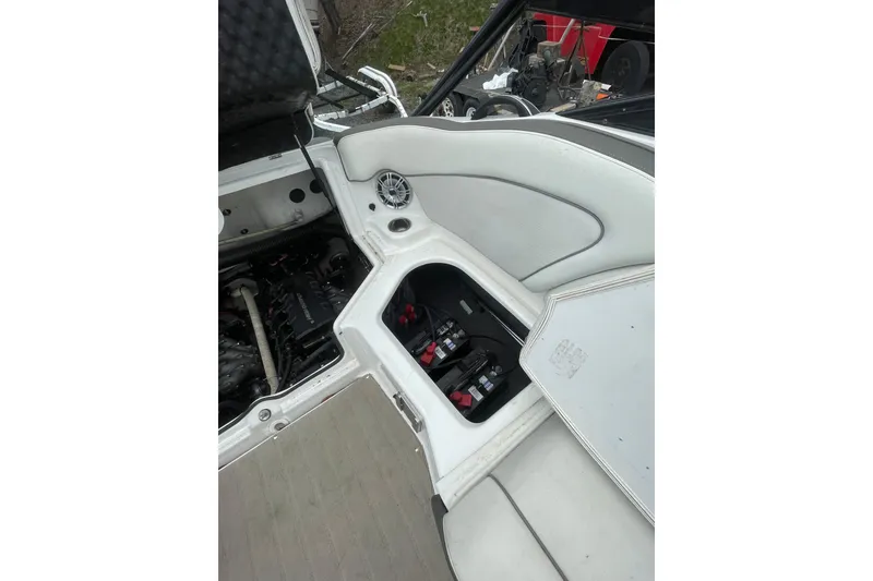 Slide: The Image of 2014 Yamaha Boats 242 Limited interior showing engine and battery compartments. - 13