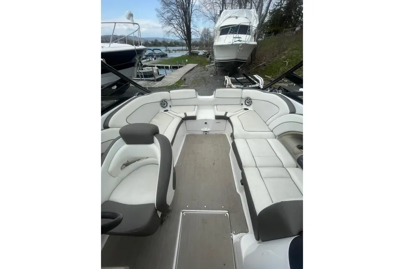 Slide: The Image of 2014 Yamaha Boats 242 Limited interior with spacious seating and elegant design. - 16