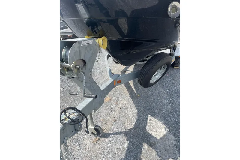 Slide: The Image of Trailer hitch of a 2014 Yamaha Boats 242 Limited on pavement. - 9