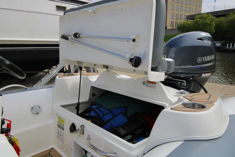 Slide: The Image of 2018 Avon Seasport 400 Deluxe NEO boat with Yamaha 50hp engine, open storage compartment. - 10